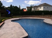 Retaining walls border pool